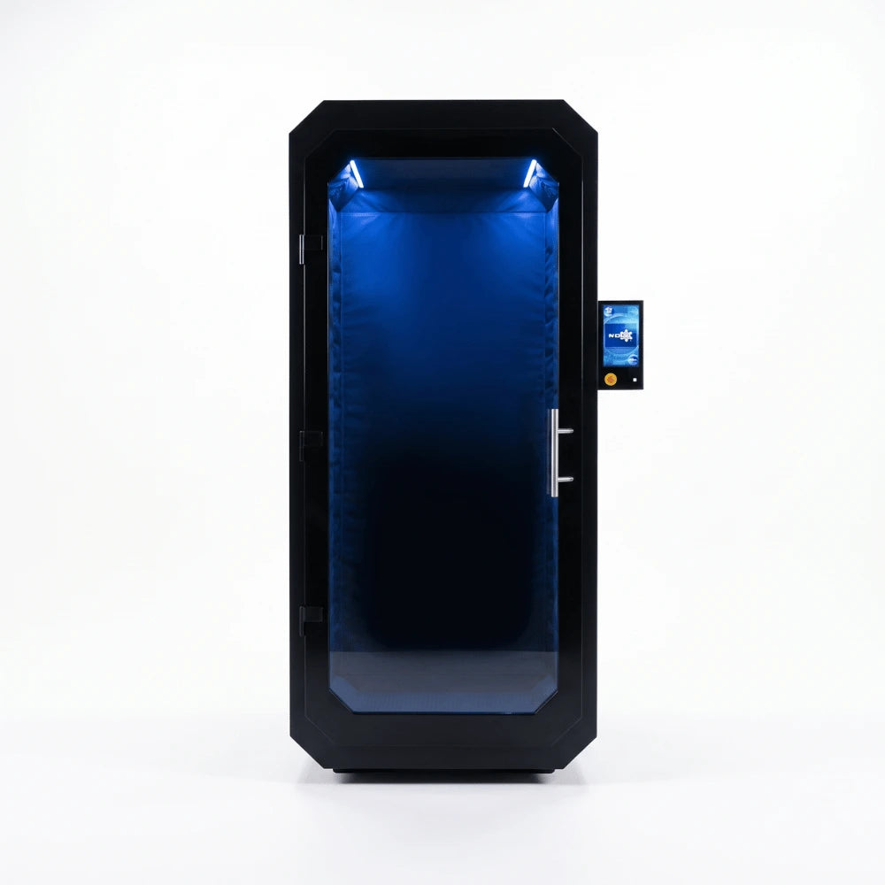 Black Antarctica Barrel electric cryotherapy chamber, front view with the door closed