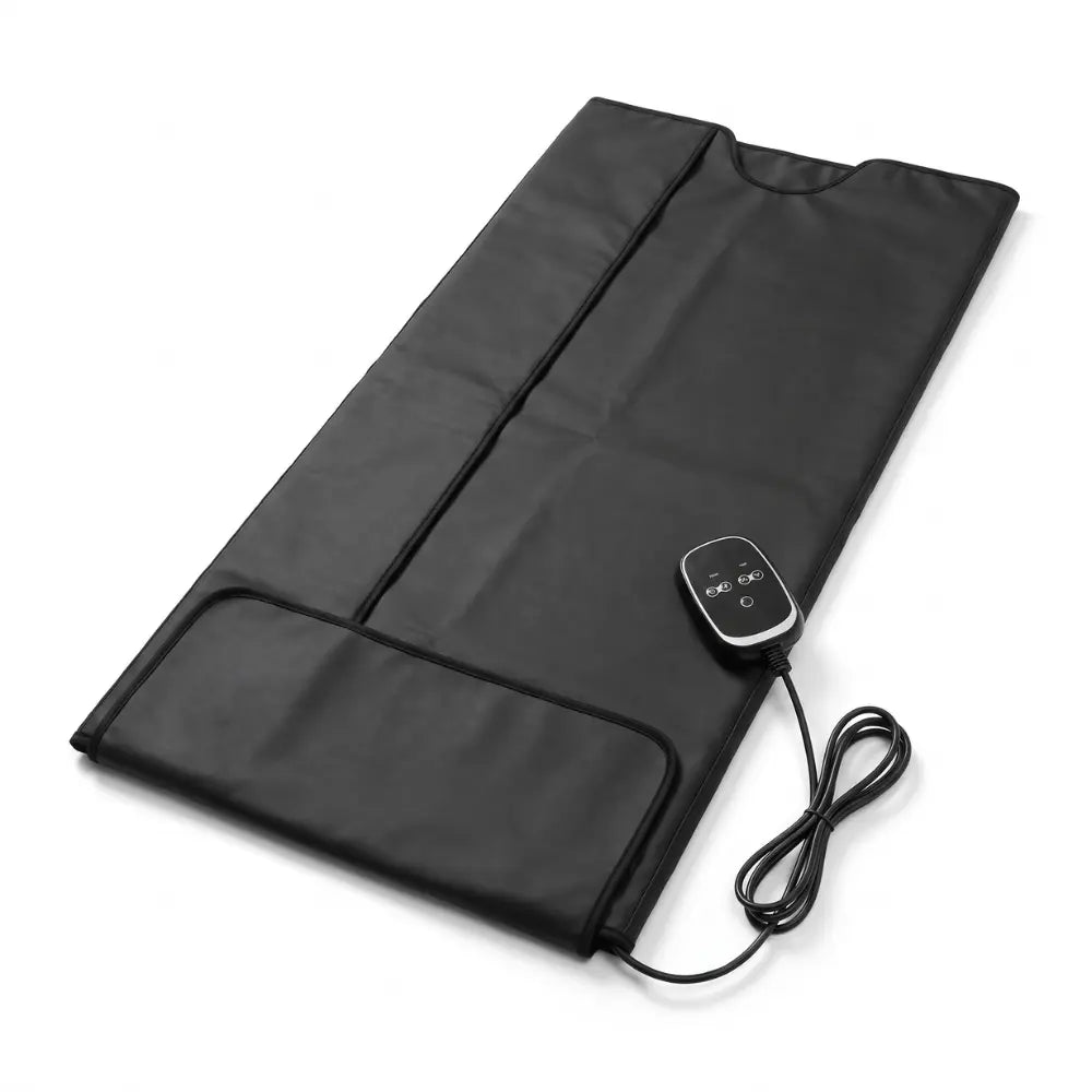 Black infrared sauna blanket laid flat with hand controller on a white background